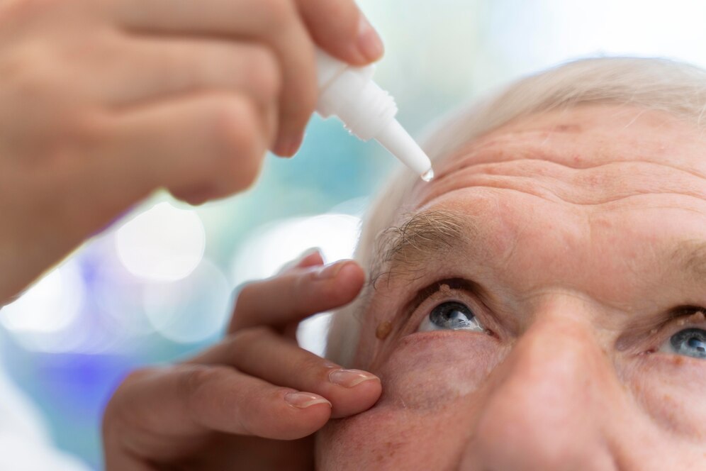 doctor-pouring-some-eye-drops-patient_23-2149082480.jpg