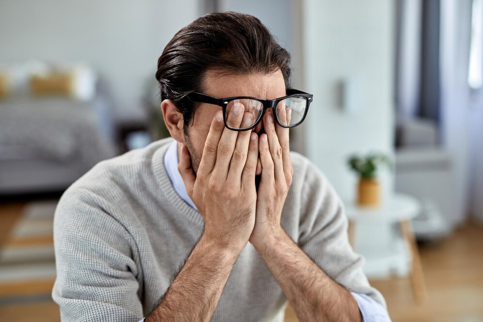 young-businessman-feeling-exhausted-while-working-home_637285-5979.jpg